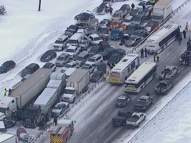 An aerial view of a multi-vehicle pileup is shown on Highway 400 near Innisfil, Ont., Thursday, Feb.27, 2014 in this television screen grab. THE CANADIAN PRESS/CTV